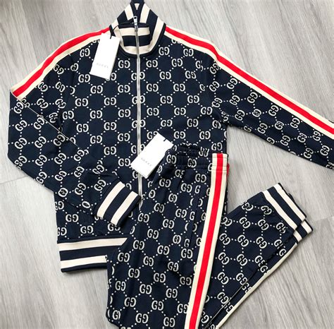 fake toddler gucci track suit|Gucci tracksuit phinks.